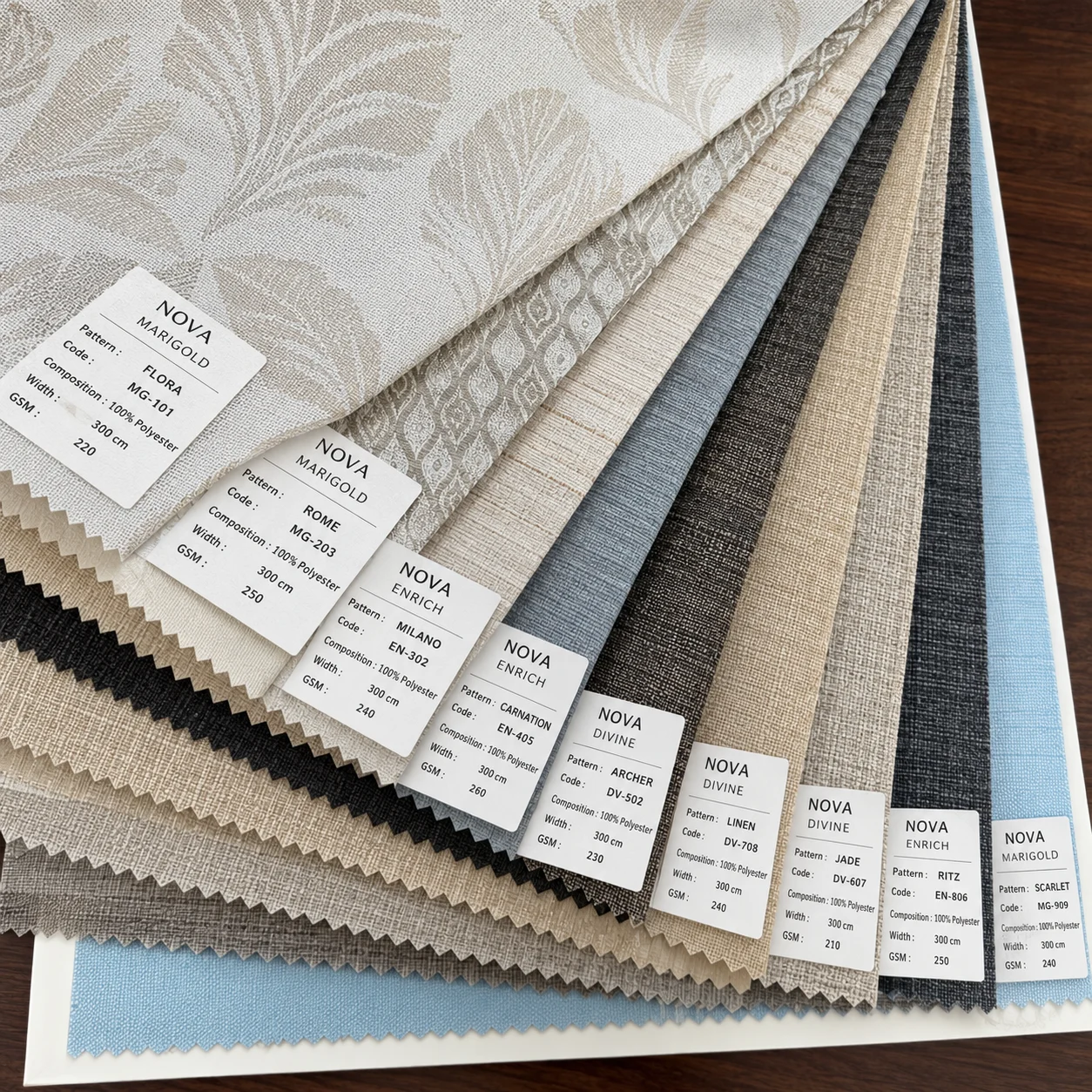 NOVA roller blind fabric swatches arranged in a sample catalogue